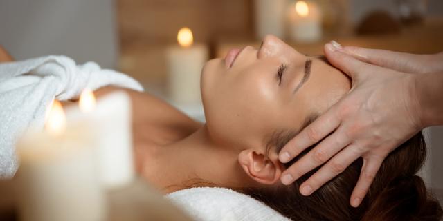 young-woman-having-face-massage-relaxing-in-spa-salon-bd.jpg