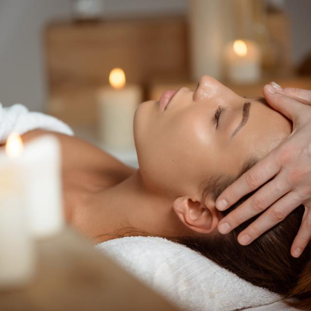 young-woman-having-face-massage-relaxing-in-spa-salon-bd.jpg